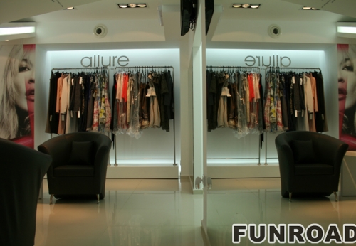 Clothing mobile store design with wooden display plinth and shelf for clothes display